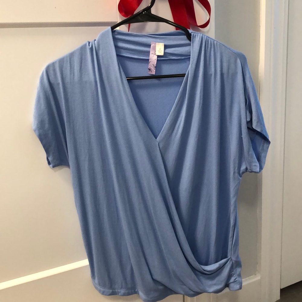 Soft and stretchy baby blue top NEVER BEEN WORN